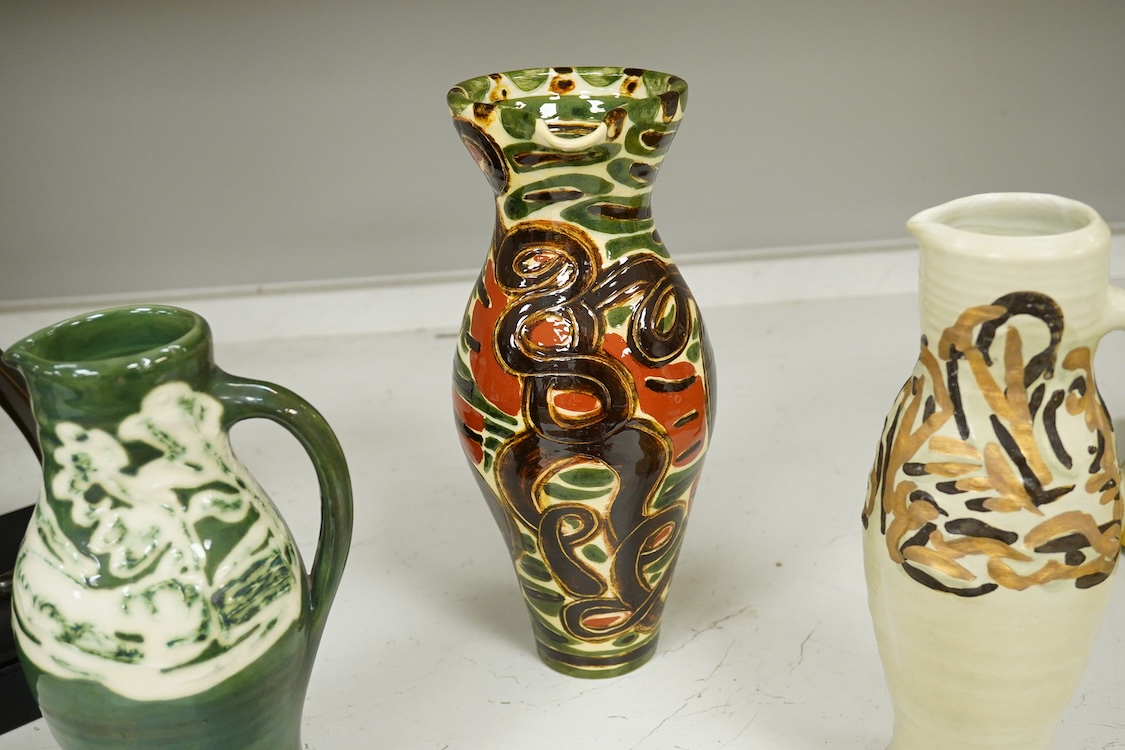 Nicola Tassie (b.1960), Three jugs and a slipware bowl, each signed to the bases, largest 28cm high